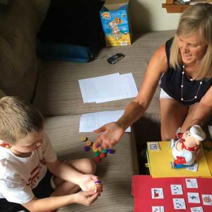 Laura working with child